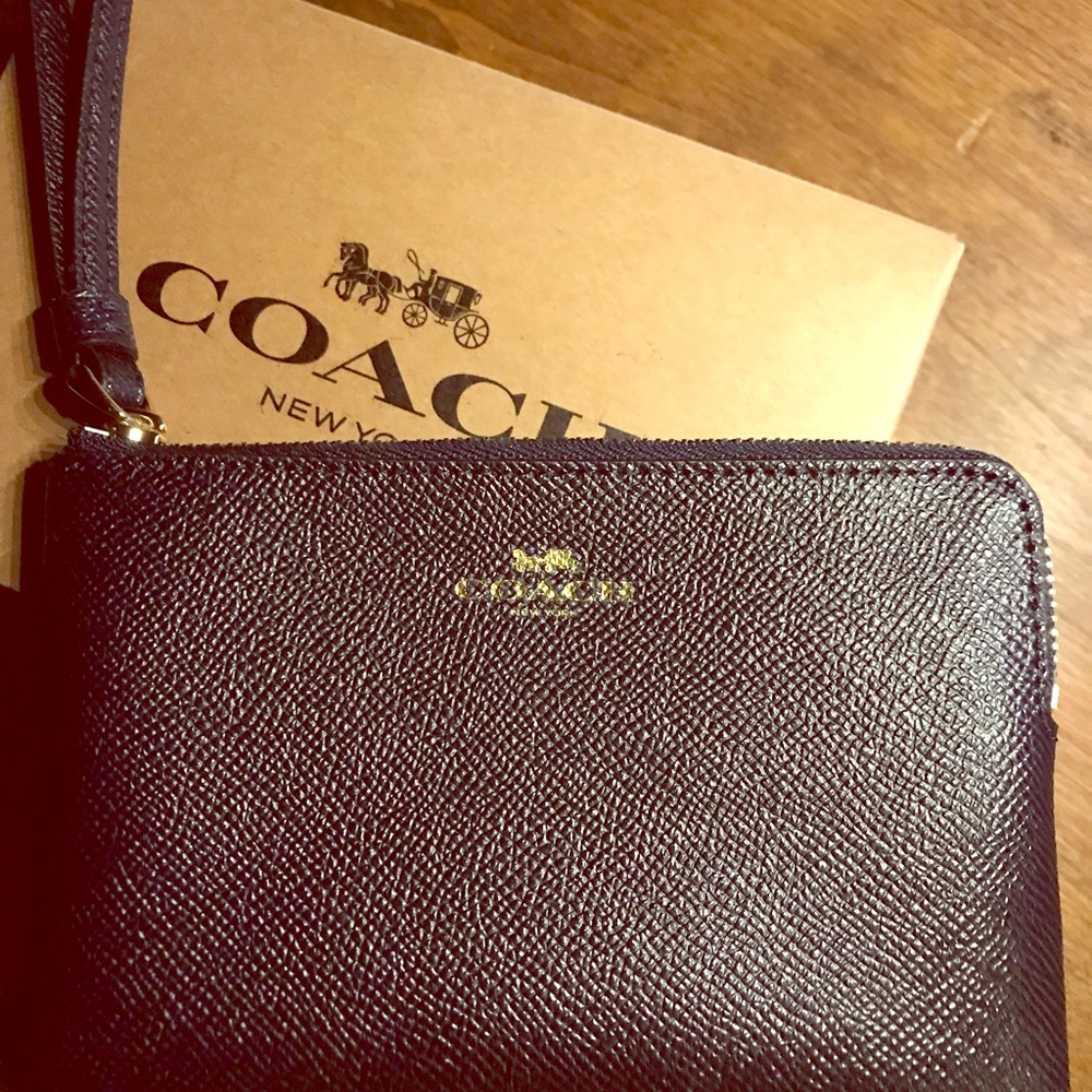 Coach Wristlet, new and authentic.